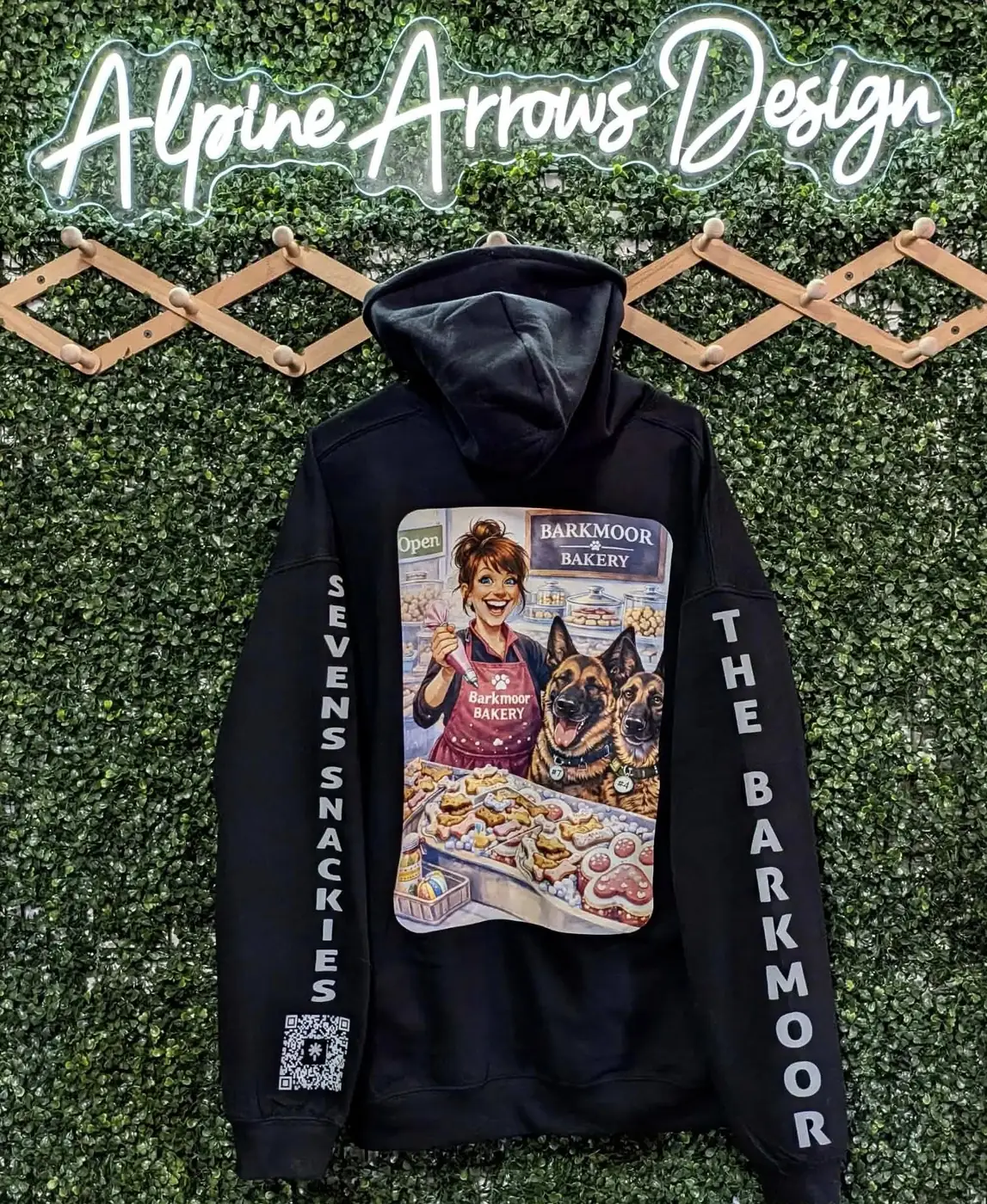 Full-color DTF printed hoodie with a large back graphic and custom sleeve lettering for a bakery