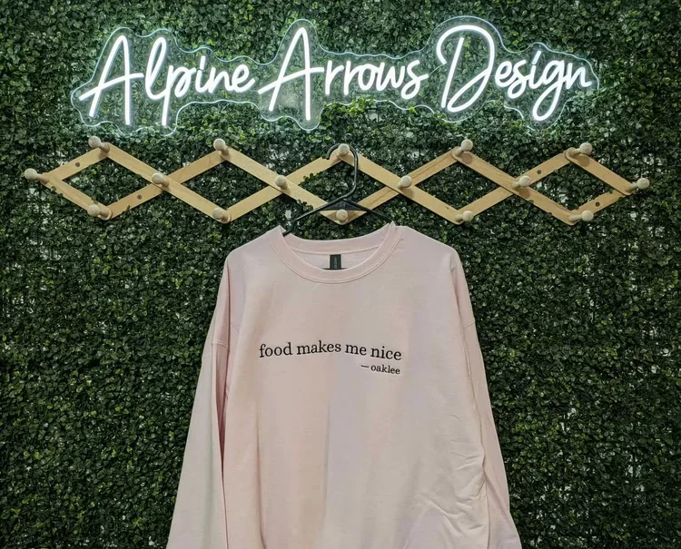 Blush crewneck sweatshirt with a personalized printed quote