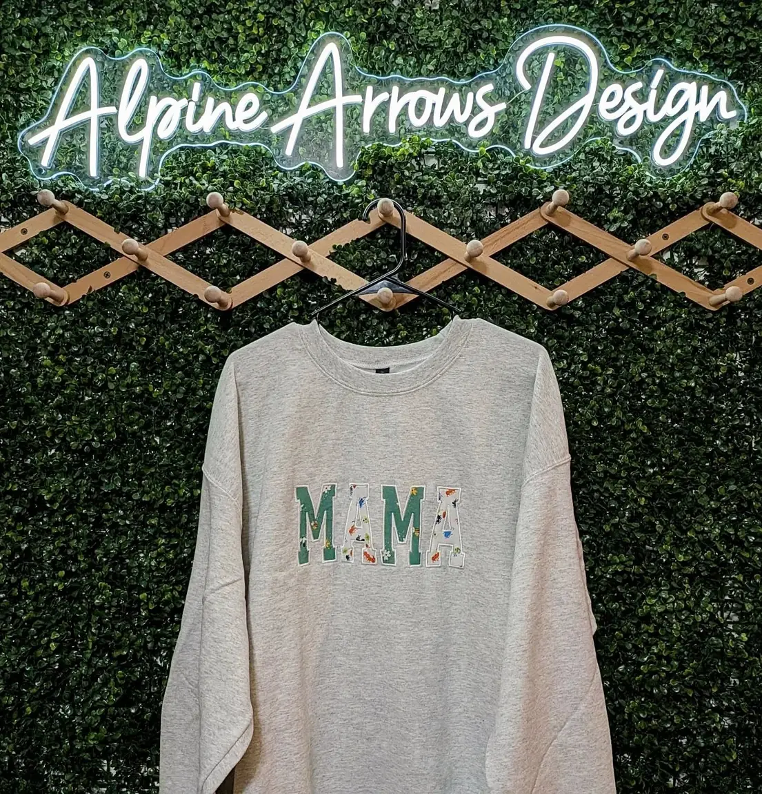 Applique crewneck sweatshirt with patterned fabric letters stitched down and outlined